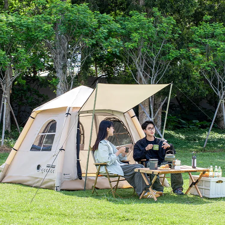 Manual inflatable tent