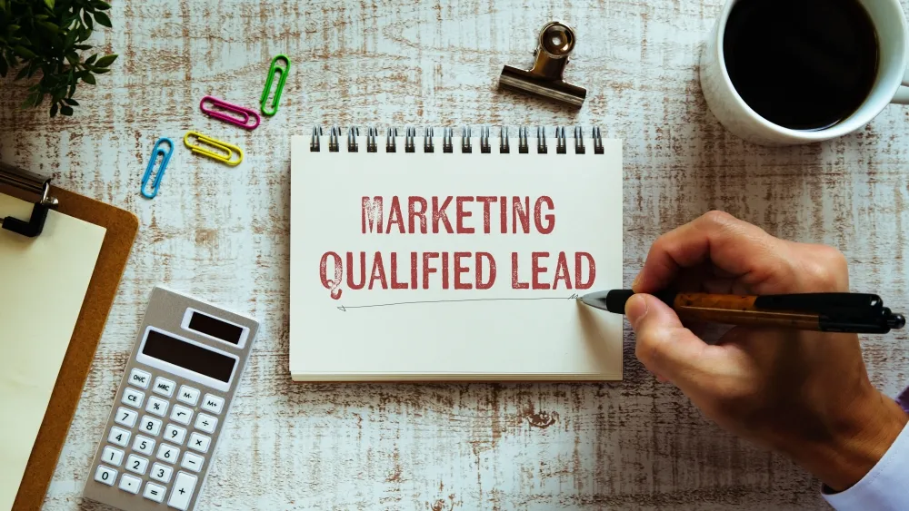 There,Is,Notebook,With,The,Word,Marketing,Qualified,Lead.,It