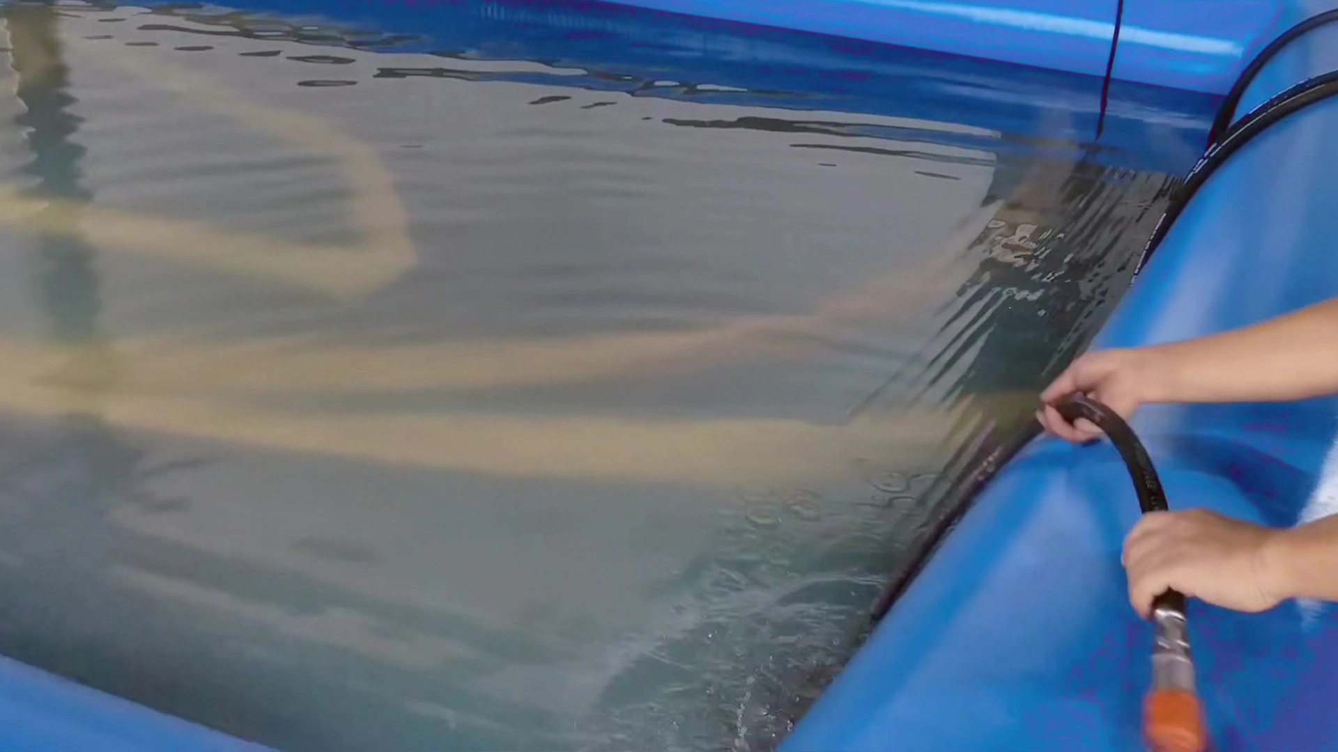 immerse hose into cold water to reduce the temperature